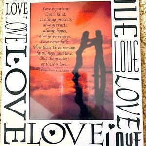 Metal Love Embossed Frame holds 5 x 7 photo.